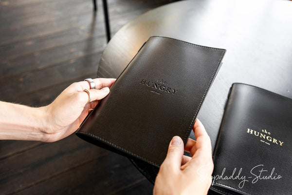Black Menu Cover with Stitching and Elastic Band with Blind Debossing