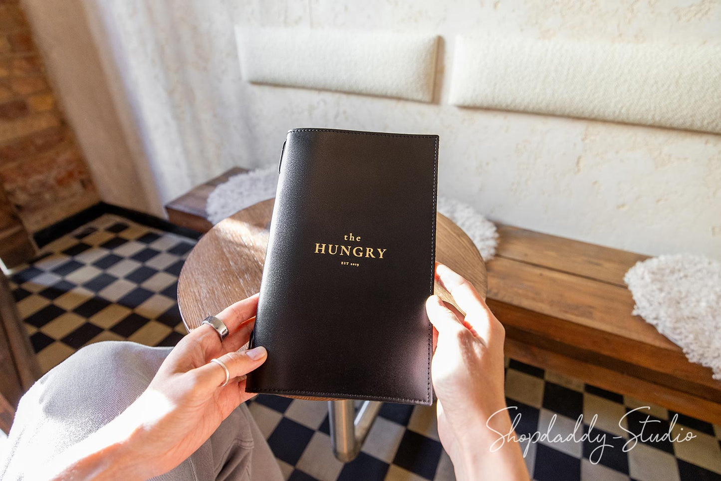 Elegant Black Menu Cover with Stitching and Elastic Band