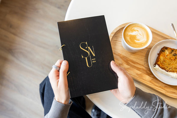 Elegant Black Plywood Menu Book with Golden Rings