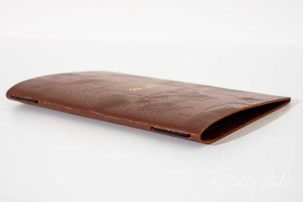 Personalized Brown Leather Menu Folder with Topographic Pattern for bar