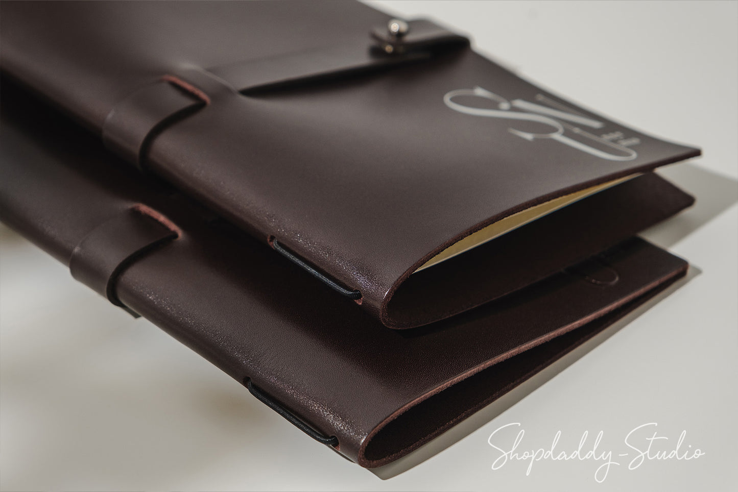 stylish dark brown thick leather menu cover, perfect for upscale restaurants or bars.