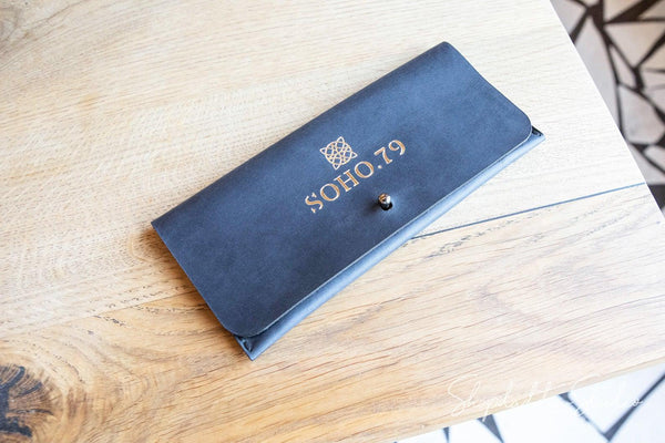blue leather check holder for restaurant