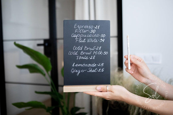 chalkboard with pencil for restaurant menu