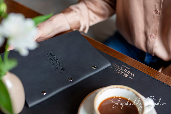 Black Leather Menu Cover with Brass Bolts for Hospitality