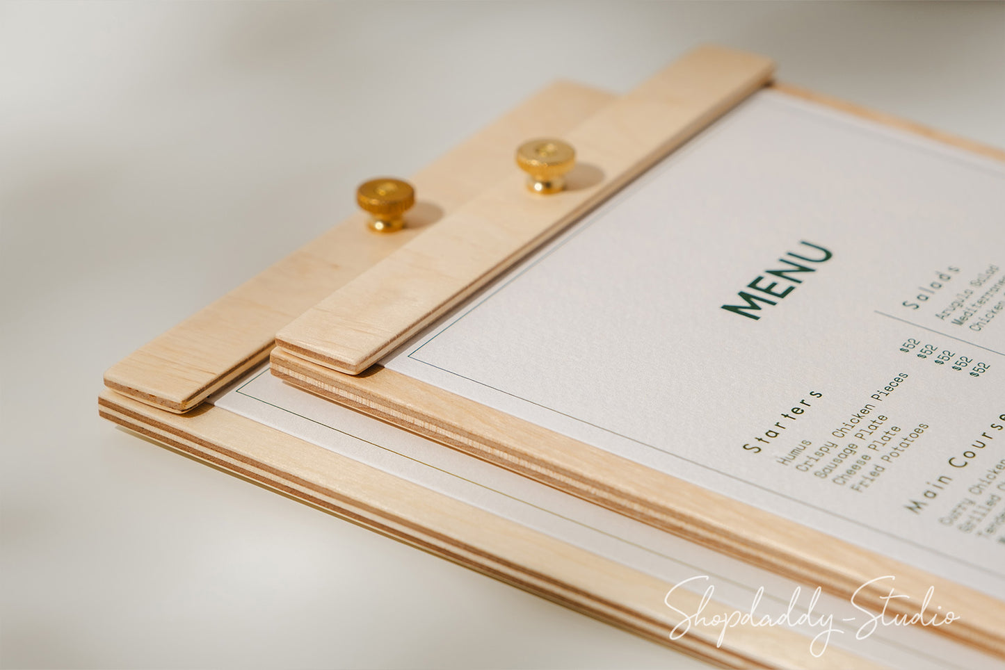 A durable and versatile plywood menu board with a brass screw, ideal for showcasing menus.
