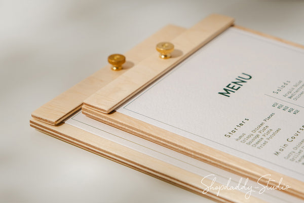 A durable and versatile plywood menu board with a brass screw, ideal for showcasing menus.
