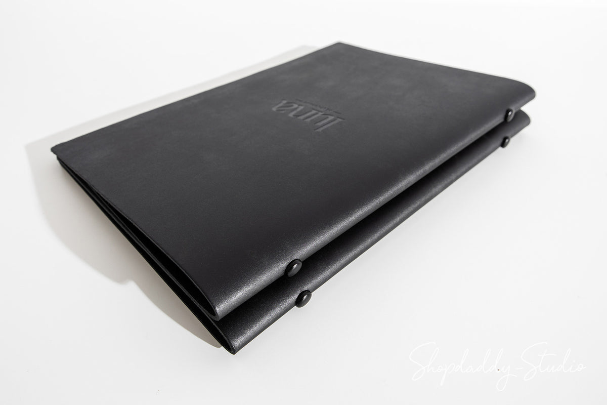 Antique Black Recycled Leather Menu Cover With Plastic Sleeves in details