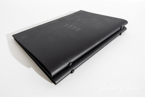 Antique Black Recycled Leather Menu Cover With Plastic Sleeves in details