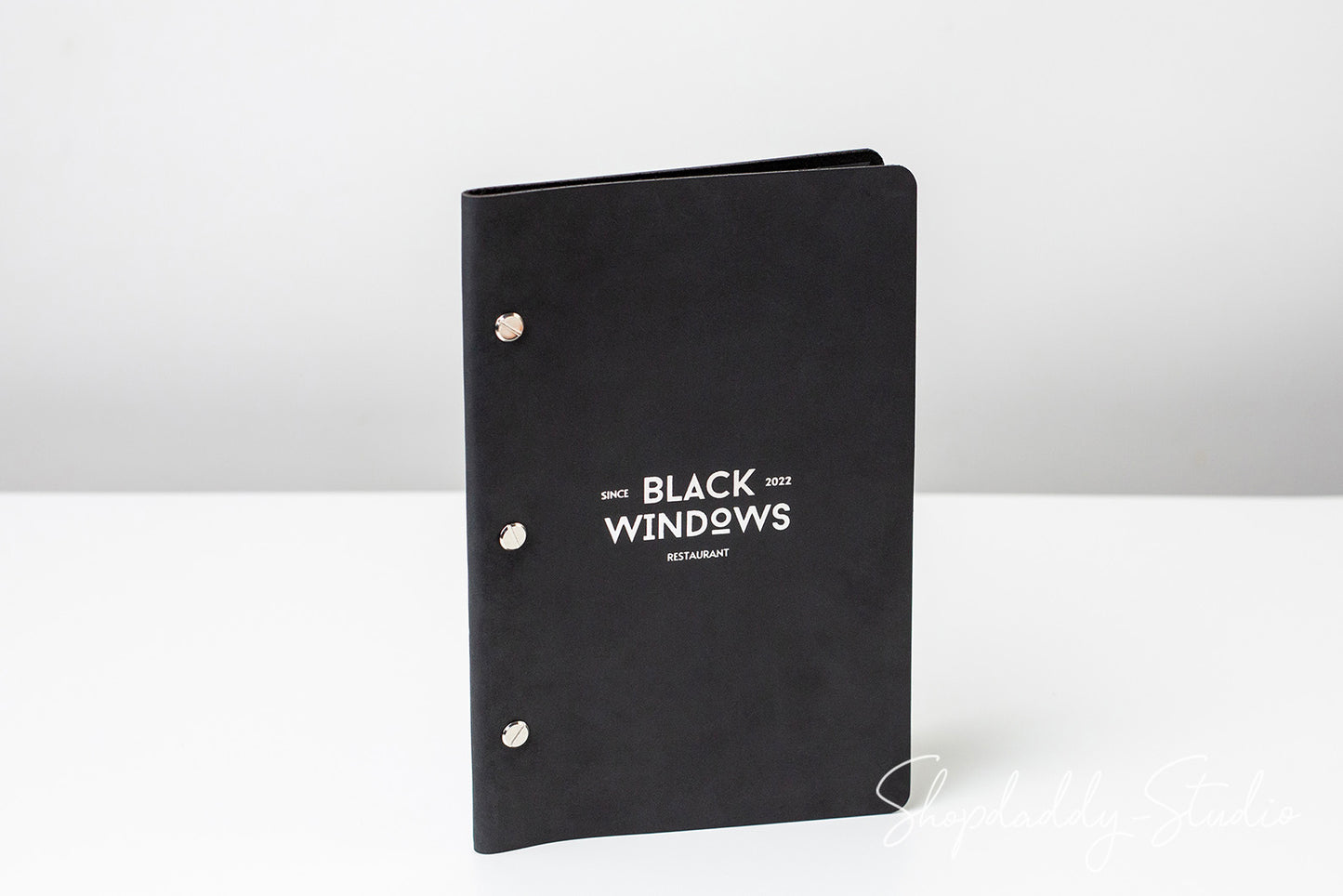 Black Leather Menu Cover with Brass Bolts for Menu Presentation