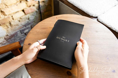 Black Menu Cover with Stitching and Elastic Band and gold logo