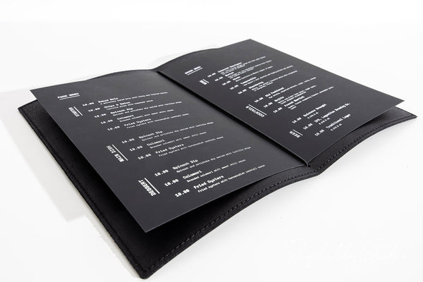 Black Menu Cover with Stitching and Elastic Band in details