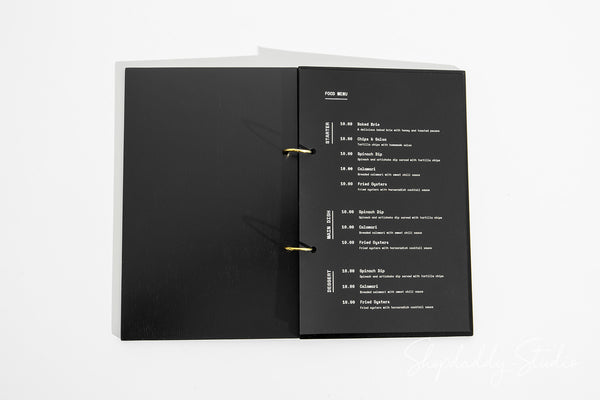 Black Plywood Menu Book with Golden Rings for Fine Dining