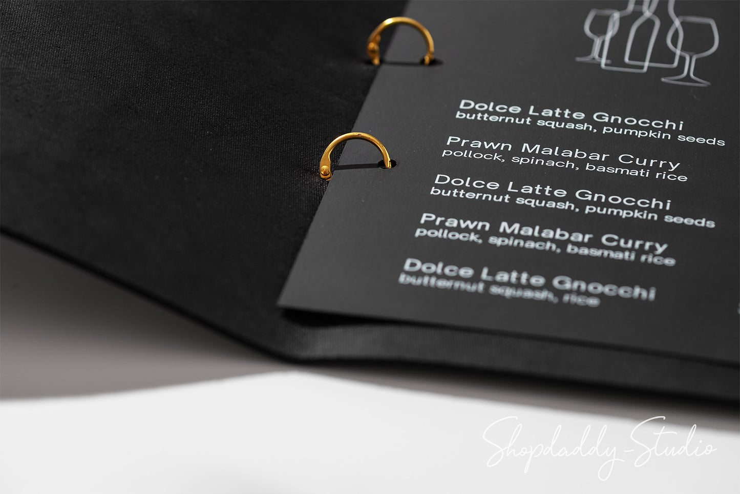 Black Thick Leather Menu Cover with Golden Rings in details