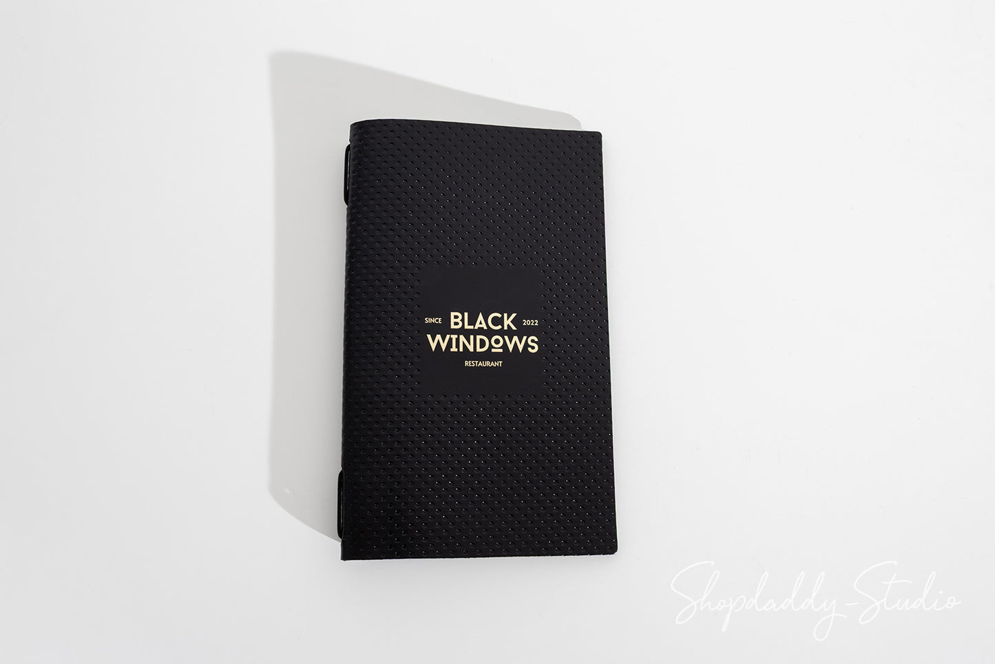 Custom Black Leather Menu Cover with Perforated Pattern