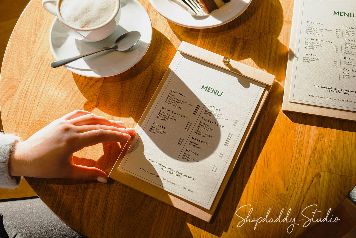 Customizable plywood menu board with a brass screw, designed for a modern dining aesthetic