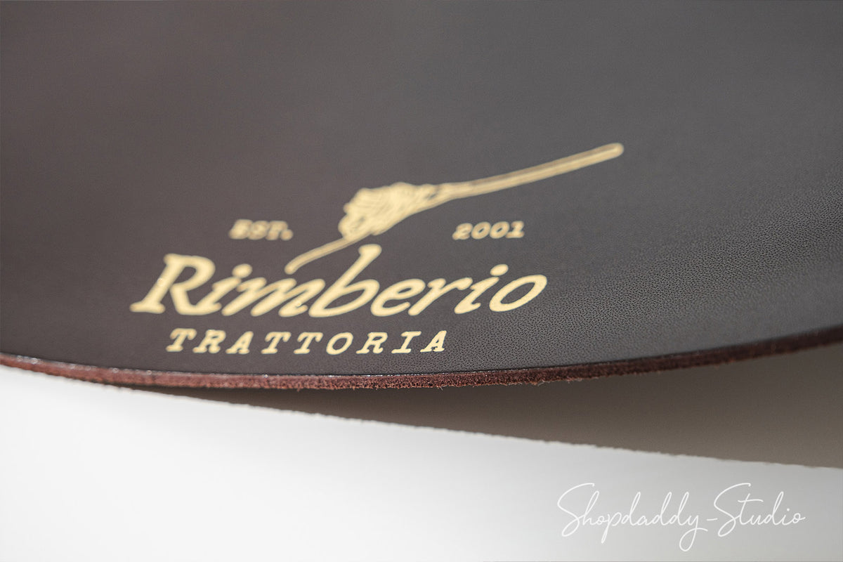 Dark_Brown_Leather_Oval_Table_mat_for_cafe