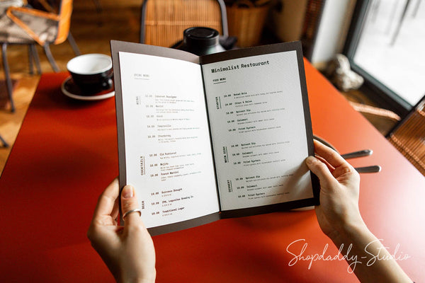 Eco-friendly leather menu cover in antique brown, featuring a durable elastic band.