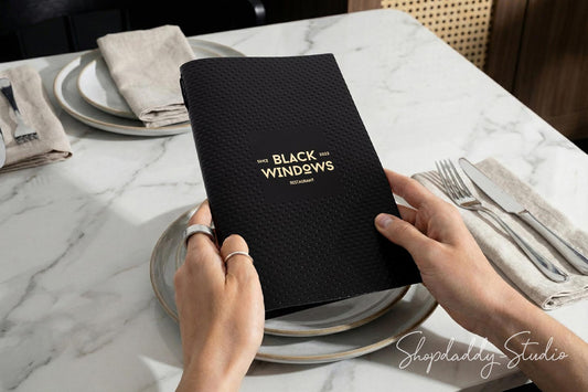 Elegant Black Leather Menu Cover with Perforated Pattern