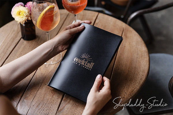 Elegant Black Thick Leather Menu Cover with Golden Rings for bar