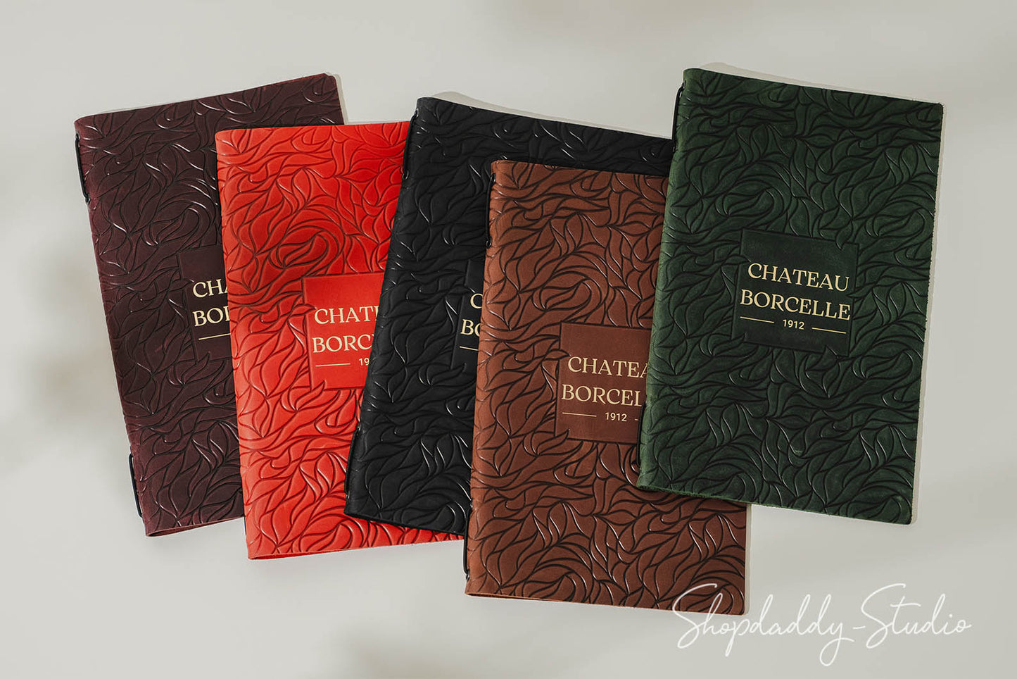 Green Leather Menu Cover with Leaf Pattern with Gold Logo