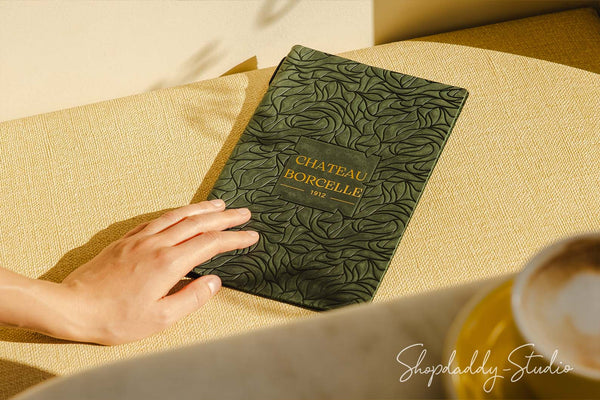 Green Leather Menu Cover with Leaf Pattern with Logo