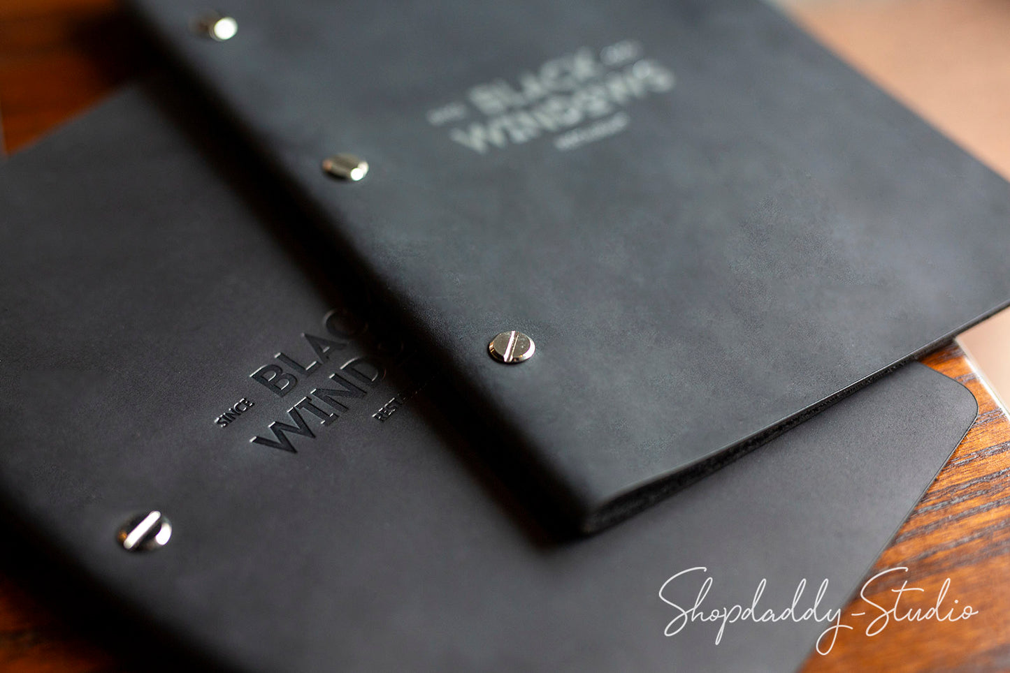 Luxury Black Leather Menu Cover with Brass Bolts