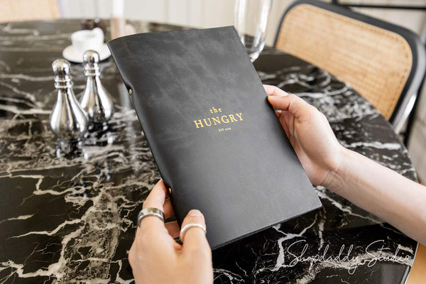 Recycled leather menu cover with metal ring binder and custom logo