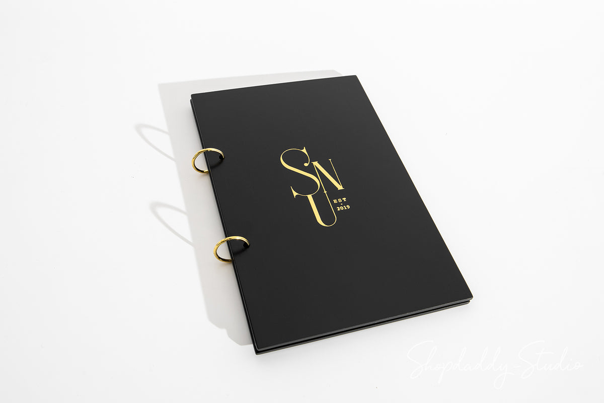 Minimalist Black Plywood Menu Book with Golden Rings