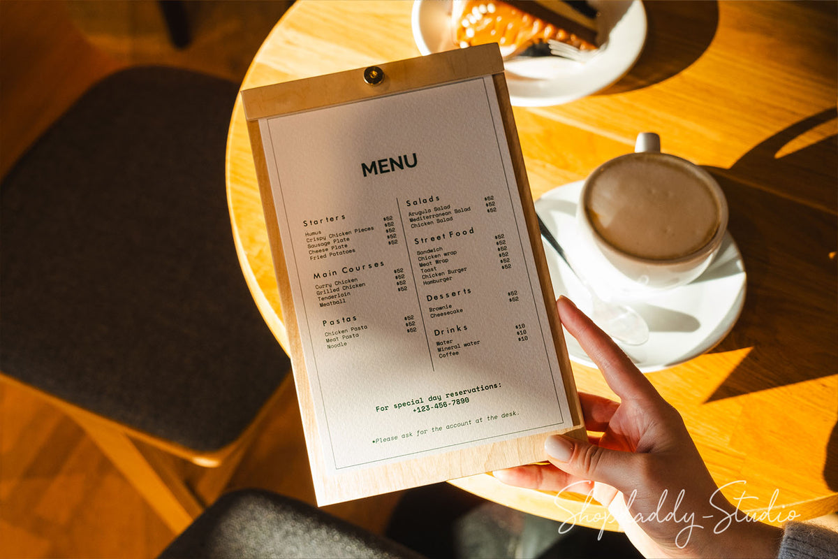 Plywood menu board with a natural wood texture and brass screw, blending simplicity and functionality.