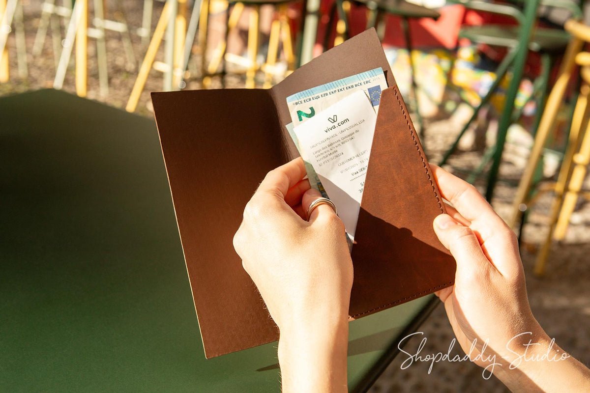 Rustic recycled bonded leather check holder with pen loop for cafes and bars."