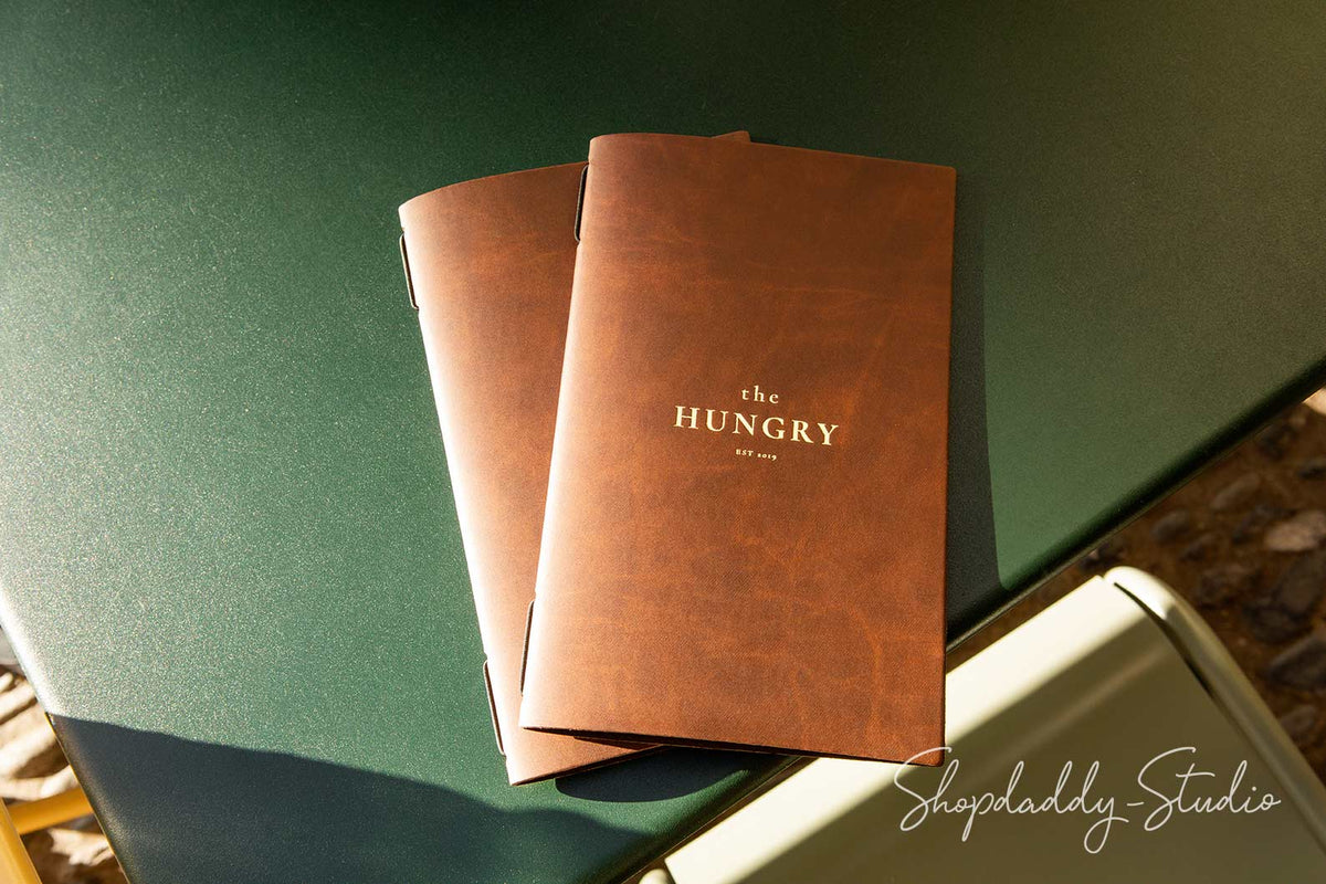 Stylish recycled leather menu holder with a rustic antique brown finish.