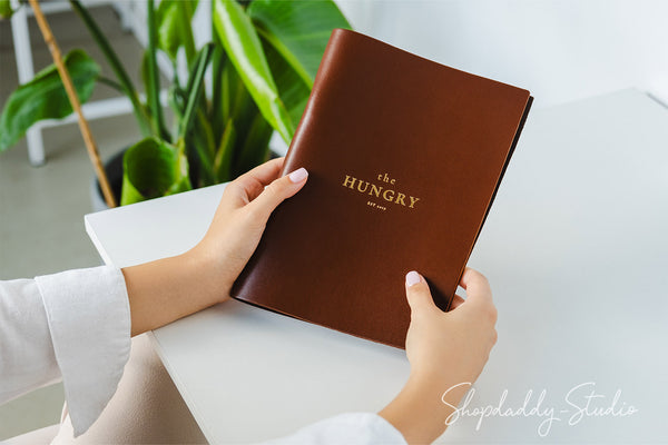 custom leather menu holder with ring mechanism for cocktail menu