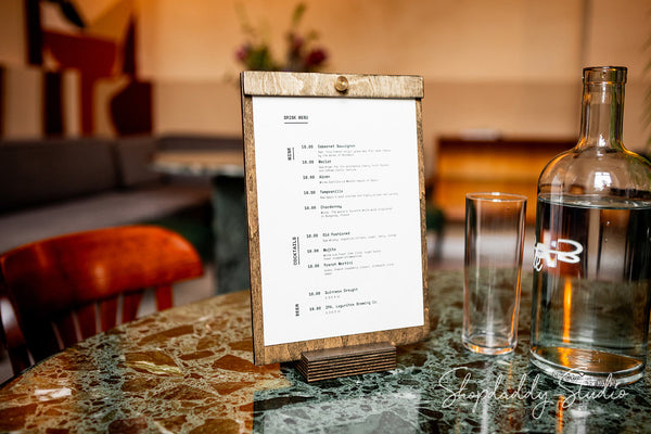 custom wood tabletop menu for restaurant with logo