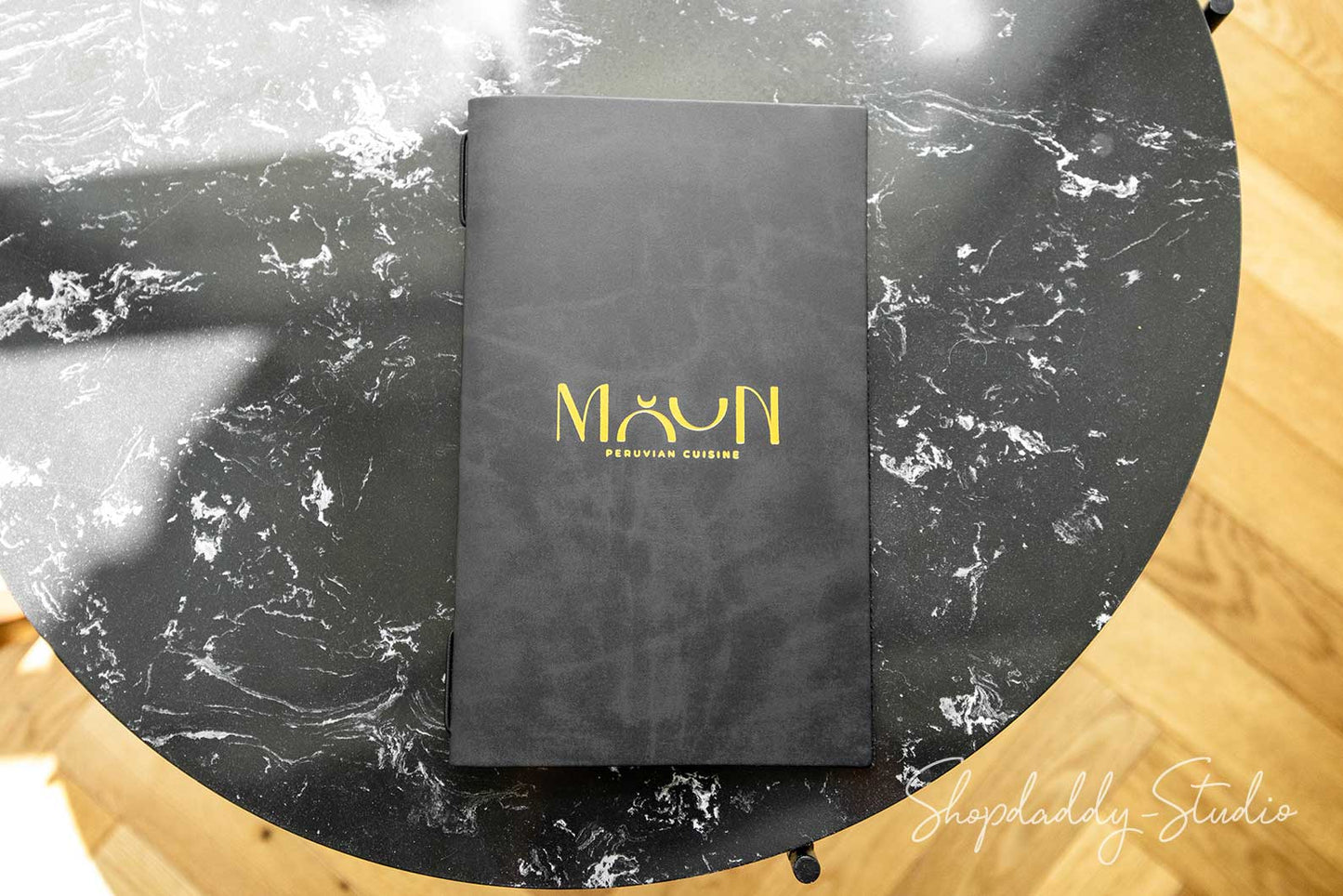 Elegant leather menu folder displayed on fine dining table