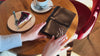 custom dark brown leather menu cover, showcasing its rich texture and durable stitching