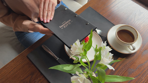 Black Leather Menu Cover with Brass Bolts