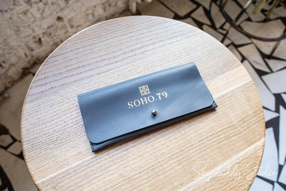 blue leather bill presenter for restaurant for cash and cards