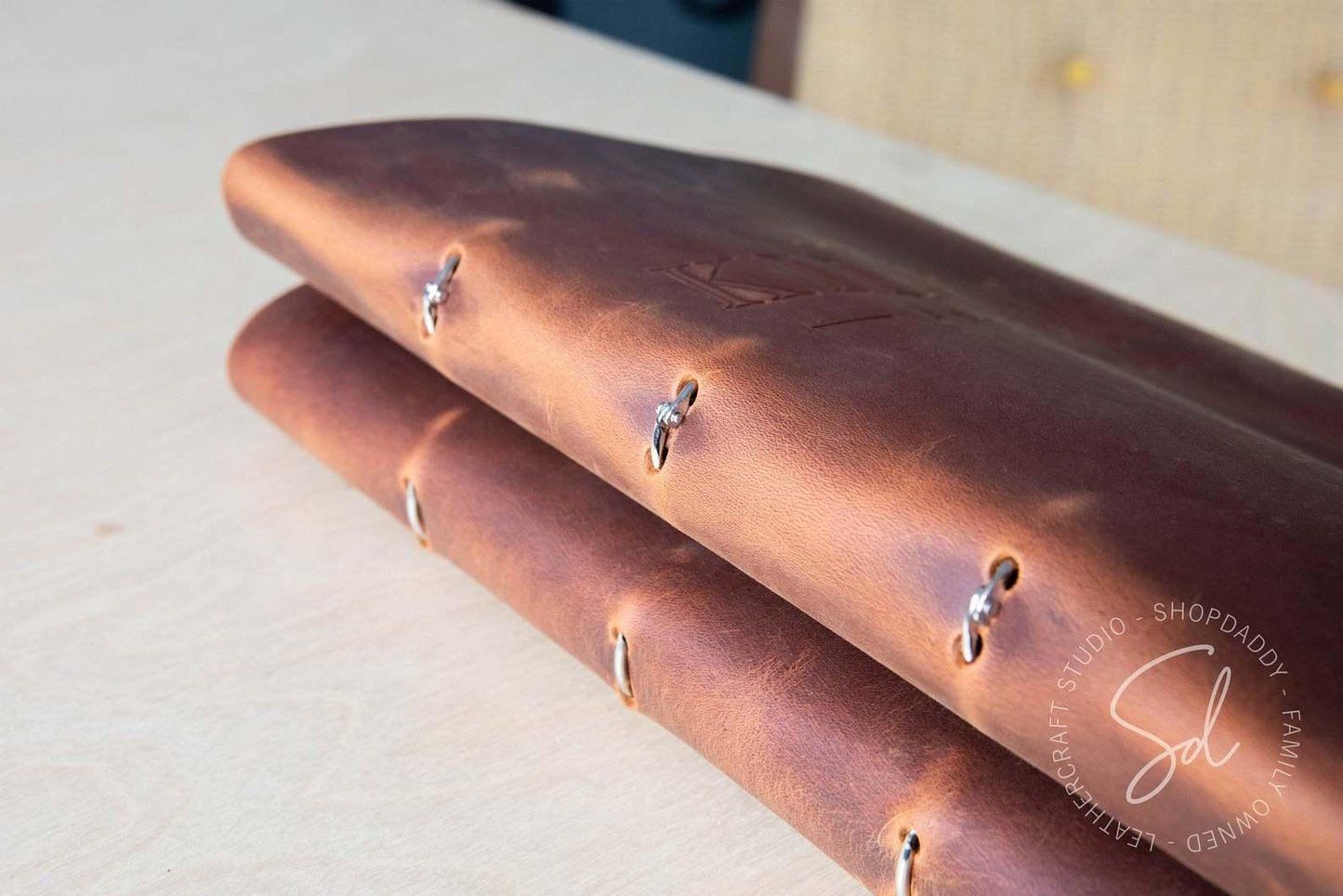 Rusty Leather Menu Cover with Steel Rings and logo