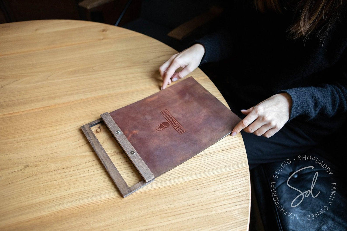 Rusty Leather Menu Holder with Wooden Handle and logo