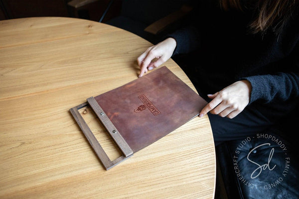 Rusty Leather Menu Holder with Wooden Handle and logo